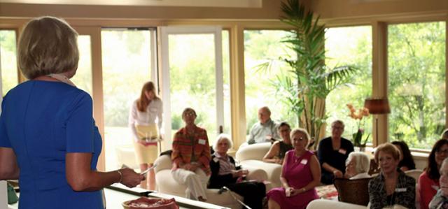 Julie speaking to a group