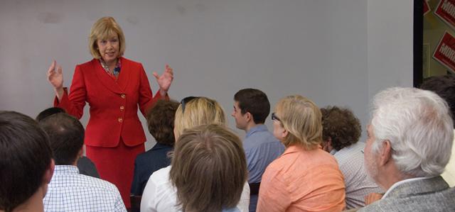 Julie speaking to a group